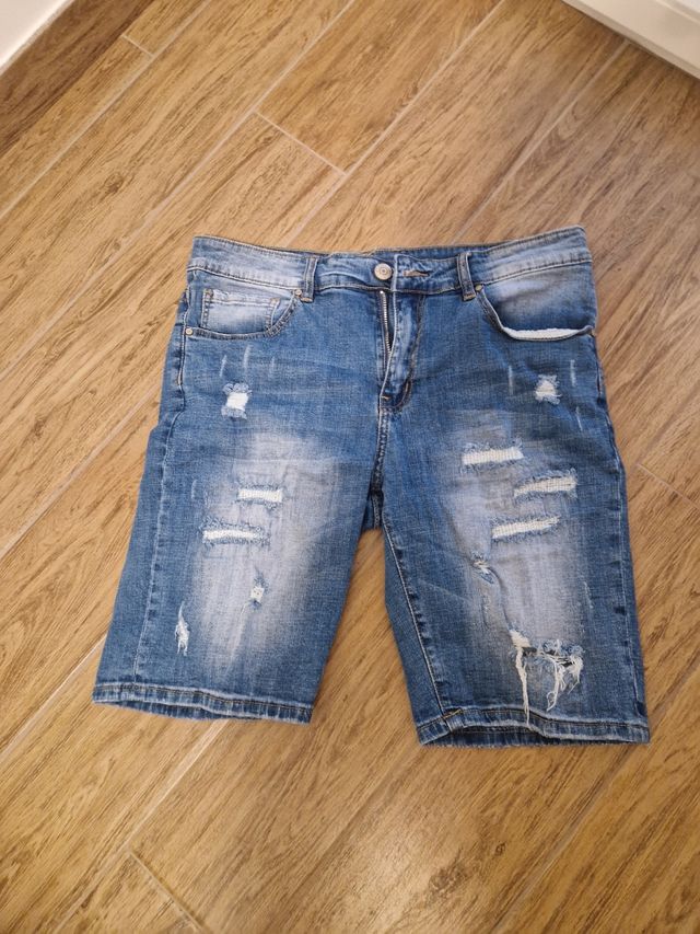 Bermuda jeans strappati blu taglia 50