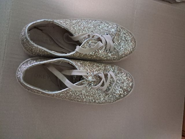 Zapatillas brillantes doradas