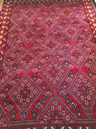 Alfombra persa roja y azul