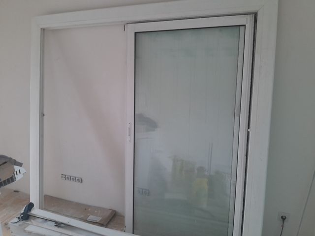 Puerta corrediza doble