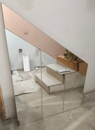 Espejo grande triangular