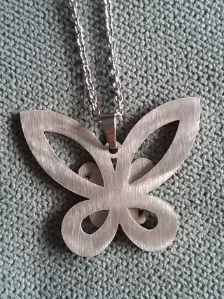 Colgante mariposa de INOX.