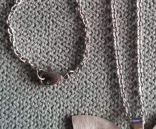 Colgante mariposa de INOX.