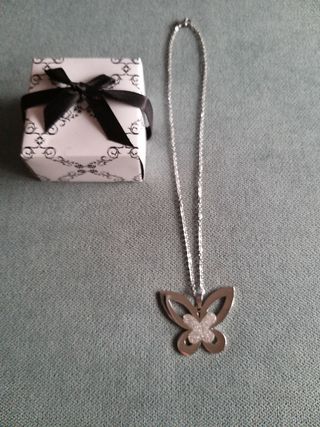 Colgante mariposa de INOX.