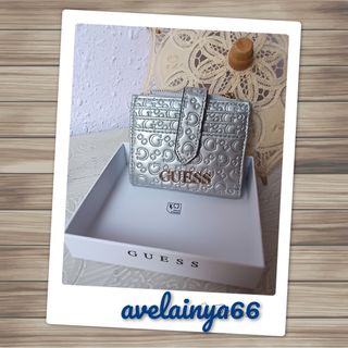 Monedero Guess plateado