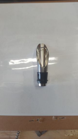 Set apribottiglie in metallo argento