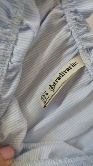 Blusa blanca y azul, palabra de honor