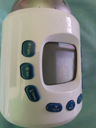 Reloj despertador con proyector de estrellas