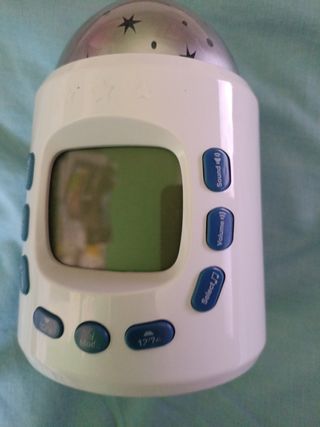 Reloj despertador con proyector de estrellas