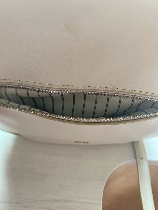 Mochila beige pequeña