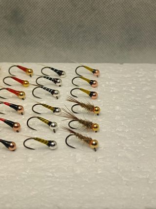 Moscas secas,ninfas y perdigones sin muerte.