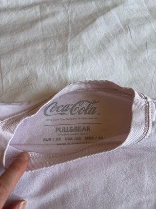 Camiseta rosa CocaCola de Pull & Bear
