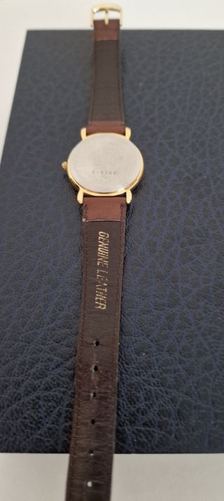 Reloj Casio dorado y marrón