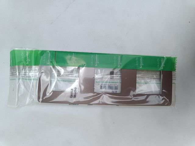 Marco interruptor Schneider NU280616 marrón