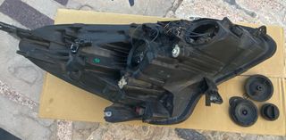 Faro delantero Opel Corsa Izquierdo