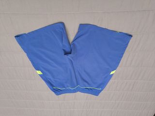 Shorts niño deporte azul-amarillo 12-14