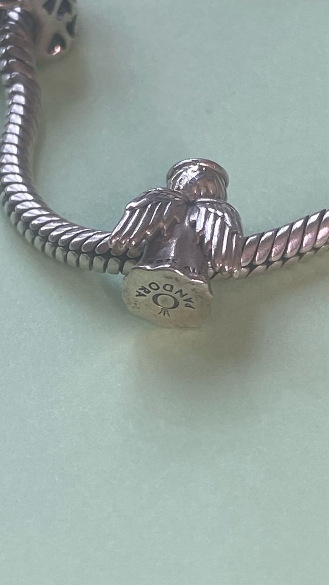 Pulsera Pandora plata  con 9 charms