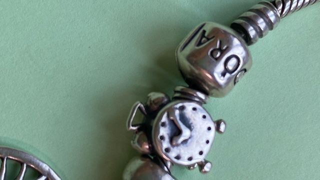 Pulsera Pandora plata  con 9 charms