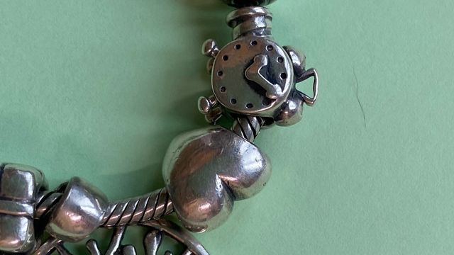 Pulsera Pandora plata  con 9 charms