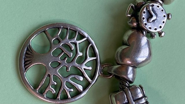 Pulsera Pandora plata  con 9 charms