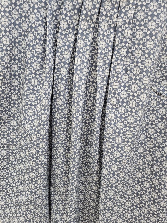 Blusa sin mangas azul y blanca