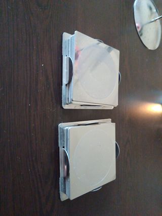 2 Portavelas metal + 11 posavasos de metal