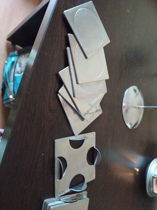 2 Portavelas metal + 11 posavasos de metal