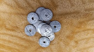 1000 Monedas 50 cent. de agujero