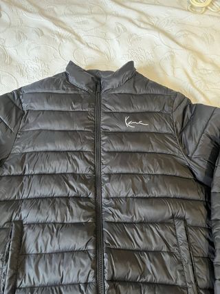 Plumifero Kani negro talla S