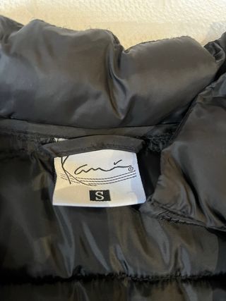 Plumifero Kani negro talla S