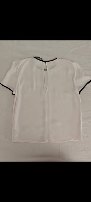 Blusa blanca c/ ribete negro