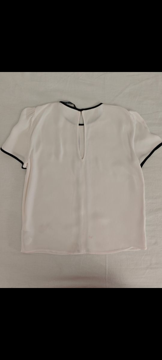 Blusa blanca c/ ribete negro