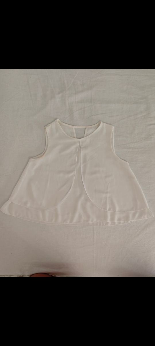 Blusa blanca sin mangas