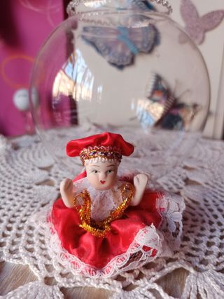Muñeca veneciana en pecera