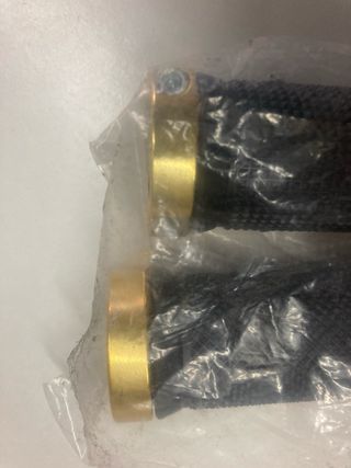 Manoplle bici nuove oro nero