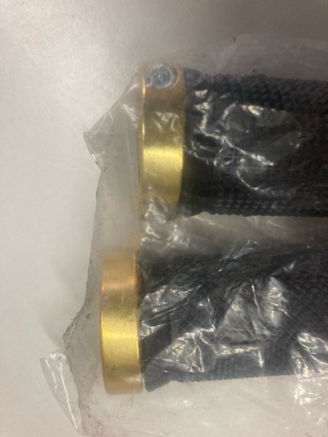 Manoplle bici nuove oro nero