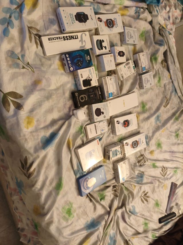 Lote relojes inteligentes y auriculares