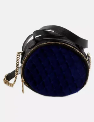 Bolso redondo con terciopelo azul