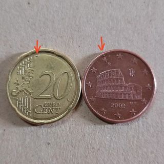 2 monete centesimi euro errore  eccesso di metallo
