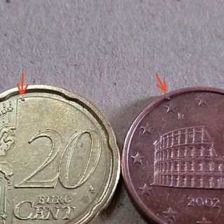 2 monete centesimi euro errore  eccesso di metallo