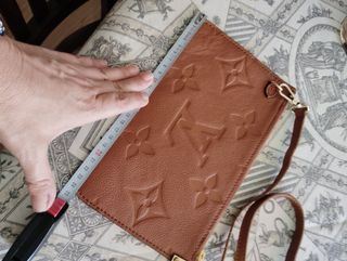 Pochette bandolera Louis Vuitton marrón