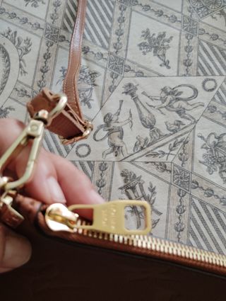 Pochette bandolera Louis Vuitton marrón