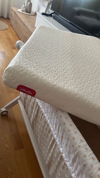 Minicuna beige con estrellas