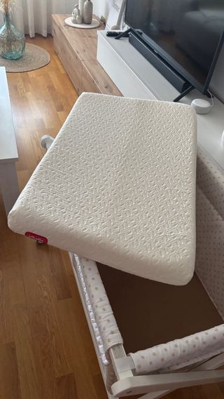 Minicuna beige con estrellas