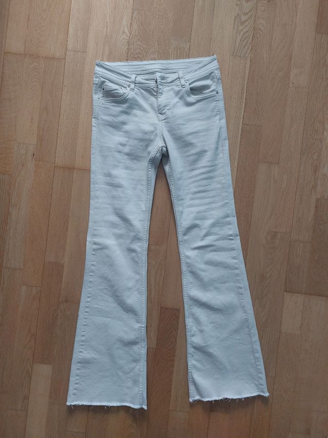 Pantalones campana beige talla M