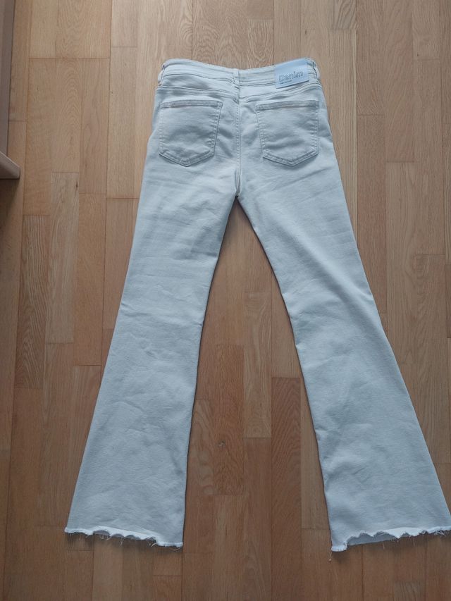 Pantalones campana beige talla M