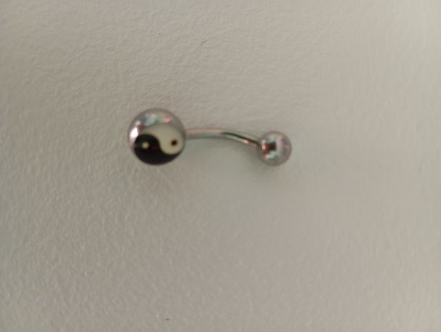 Piercing ombligo Yin Yang
