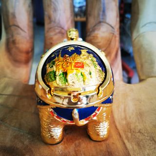 Elefante cenicero dorado azul