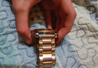 Reloj Skyline dorado y plateado