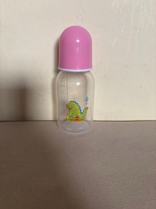 Muñeco bebé niña con biberon 